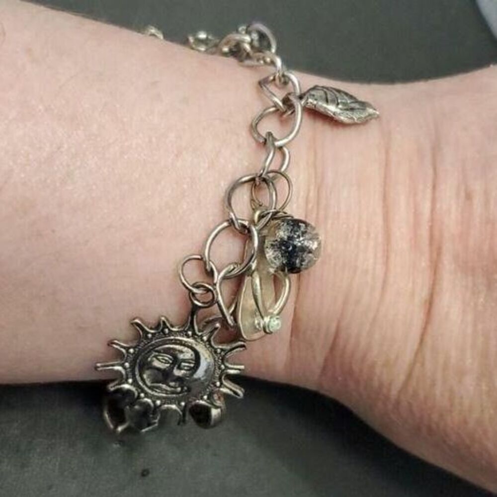 Silver tone charm bracelet